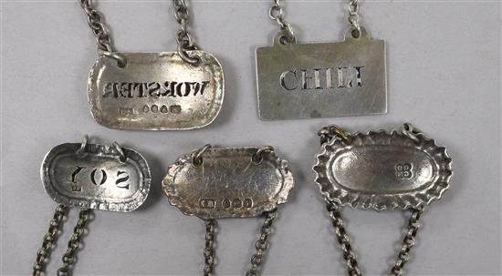 Five George III and later silver sauce labels;